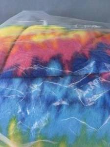 lot 525 image: Two Bolts of Fleece Fabric - Rainbow Tie Dye