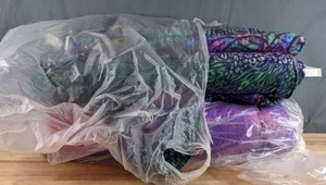lot 532 image: Two Bolts of Multicolored Animal Print Fleece Fabric - Z