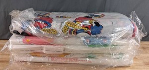lot 490 image: Three Bolts of Cut & Sew Fabric Panels (Minnie Mouse and Care Bears) - Z
