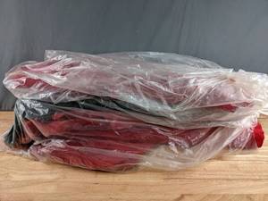 lot 505 image: Two Stacks of Solid Red and Green Fabric - Z