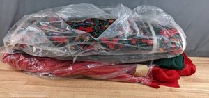 lot 503 image: Three Bolts of Coordinating Fabric (1-Christmas Print, Solid Red, Solid Green) - Z