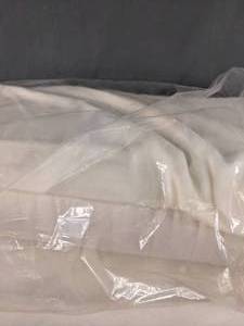 lot 512 image: Two Bolts of Off-White Material