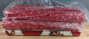 lot 435 image: Three Bolts of Christmas Holiday Fabric (2-Red Snowflake, 1-Red Santa) - Z