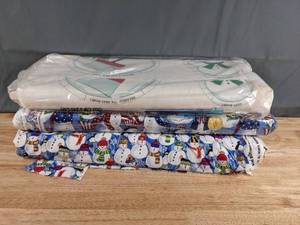 lot 174 image: Collection of Christmas Themed Bolts of Fabric Cut-Outs, Patriotic Snowmen, & More - Z