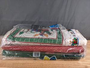 lot 245 image: Collection of Christmas Themed Bolts of Fabric - Z