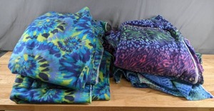 lot 328 image: Two Stacks of Patterned Fleece Fabric (Purple, Blue and Green Prints) - Z