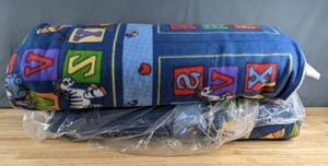 lot 290 image: Two Bolts of Fleece Fabric (Alphabet & Zebra) - Z