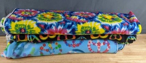 lot 291 image: Three Bolts of Fabric (Tie Dye, Peace Hearts, Peace Flowers) - Z