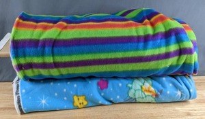 lot 297 image: Two Bolts of Fleece Fabric (Stripes & Care Bears) - Z