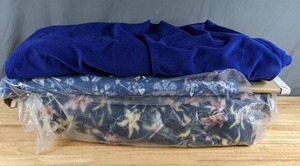 lot 303 image: Three Bolts of Fleece Fabric (Solid Blue, SnowflakesStars and Floral) - Z