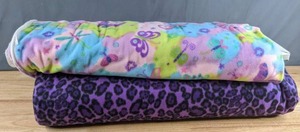 lot 278 image: Two Bolts of Fleece Fabric (Pastel DragonflyButterfly & Purple Leopard Print) - Z