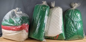 lot 286 image: Four Bags of Pre-Quilted Fabric (Red, Green and White) - Z