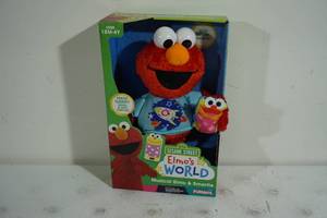 lot 107 image: NEW Sesame Street Elmos World Musical Elmo and Smartie Toy