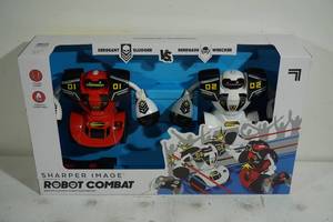 lot 102 image: NEW Sharper Image Robot Combat Set