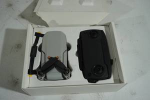 lot 161 image: BROKEN DJI Mini SE Camera Drone