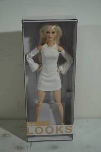 lot 106 image: 3 NEW Barbie Looks Dolls