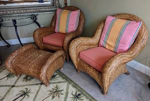 lot 124 image: Pair of Pottery Barn Malabar Rattan Armchairs and Ottoman