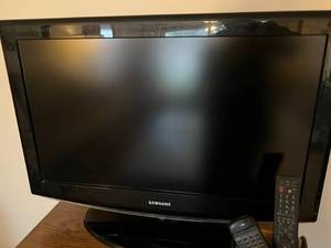 lot 33 image: Samsung TV 27.5 with Remote Holder