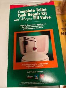 lot 55 image: Toilet Tank Repair Kit & Oak Towel Holder