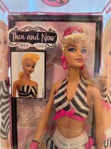 lot 111 image: Then & Now 1959-2009 Bathing Suit Barbie