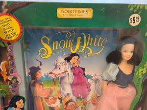 lot 131 image: Disney - Snow White & Pocahontas Dolls and Book