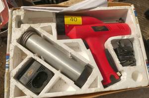 Electric caulk gun, like new, battery needs charge