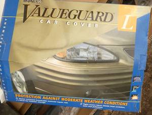 Opened but looks unused, Large car cover, fits cars 15-16 feet long