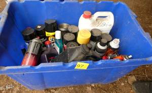 Tote of various garage chemicals