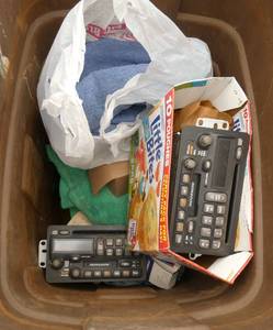 Bunch of shop rags and 2 car stereos