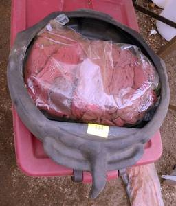 Oil pan with new bag of shop rags