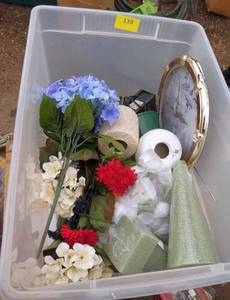 Tote of floral dcor, embroidery thread and a clock