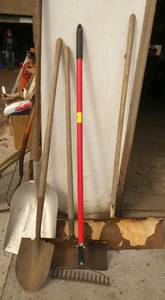 4 shovels and a rake