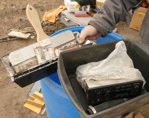 Sheetrock tools and a Ford radio