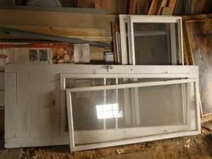 Group of windows and screen doors
