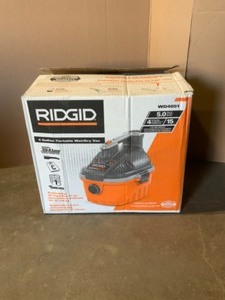 RIDGID 4 Gal. 5.0-Peak HP Portable WetDry Shop Vacuum with Filter, Dust Bag, Locking Hose and Car Nozzle. See Pictures
