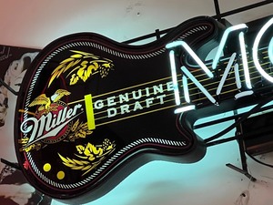 lot 1 image: Neon MGD Guitar Shaped Neon Sign