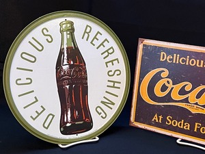 lot 11 image: Two Metal Coca-Cola Decorative Tin Signs
