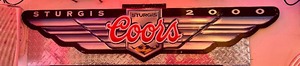 lot 19 image: Sturgis 2000 Metal Wing Wall Sign
