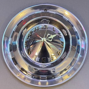 lot 125 image: Groovy Hubcap Clock