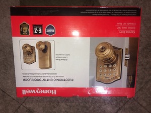 lot 29 image: Honeywell Antique Brass Keypad Electronic Knob Entry Door Lock