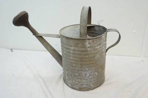 antique watering can