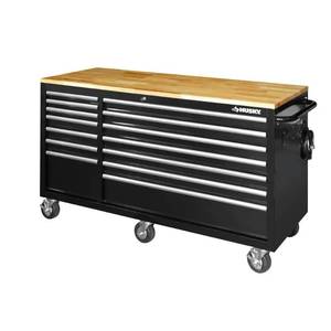lot 5 image: UNCLAIMED FREIGHT, NEW Husky 62 in. W x 24 in. D Standard Duty 14-Drawer Mobile Workbench Tool Chest with Solid Wood Top in Gloss Black, HOTC6214B12M.