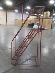 lot 33 image: (In Red) Ballymore SS520 5-Step Rolling Ladder with Spring Loaded Casters, Handrails, 16 Wide Steps, and 14 Deep Top Step, Used in Retail Warehouse.