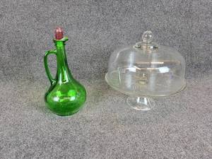 lot 242 image: Glass Cake Plate w Glass Dome and 1978 Wine World Wine Decanter - NO SHIPING