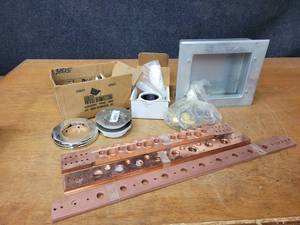 lot 248 image: Lot of HoldRite Plumbing Supports, Bath Drains and More