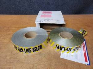 lot 256 image: (2) Rolls of Caution Tape Caution Buried Gas Line Below - 1000 x 2 Roll and 500 x 2 Roll