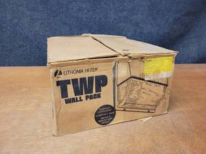 lot 272 image: New Old Stock - Lithonia Polycarbonate Refractor Wall Pack 100W High Pressure Sodium Multi-Tap Ballast - Part No. TWP100S