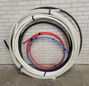 lot 279 image: Large Lot of PEX Tubing - 1 and 34 - Overall Diameter of Pile is about 48 - NO SHIPPING