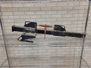 lot 193 image: The Wide Receiver Hitch System - Attaches in your skid loader Bucket to move trailers around - www.widereceiverhitchsystems.com - NO SHIPPING