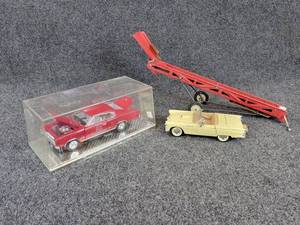 lot 385 image: Dodge Charger Diecast in Case, Ford Thunderbird and Vintage Metal Bale Elevator - Elevator is about 16 Long